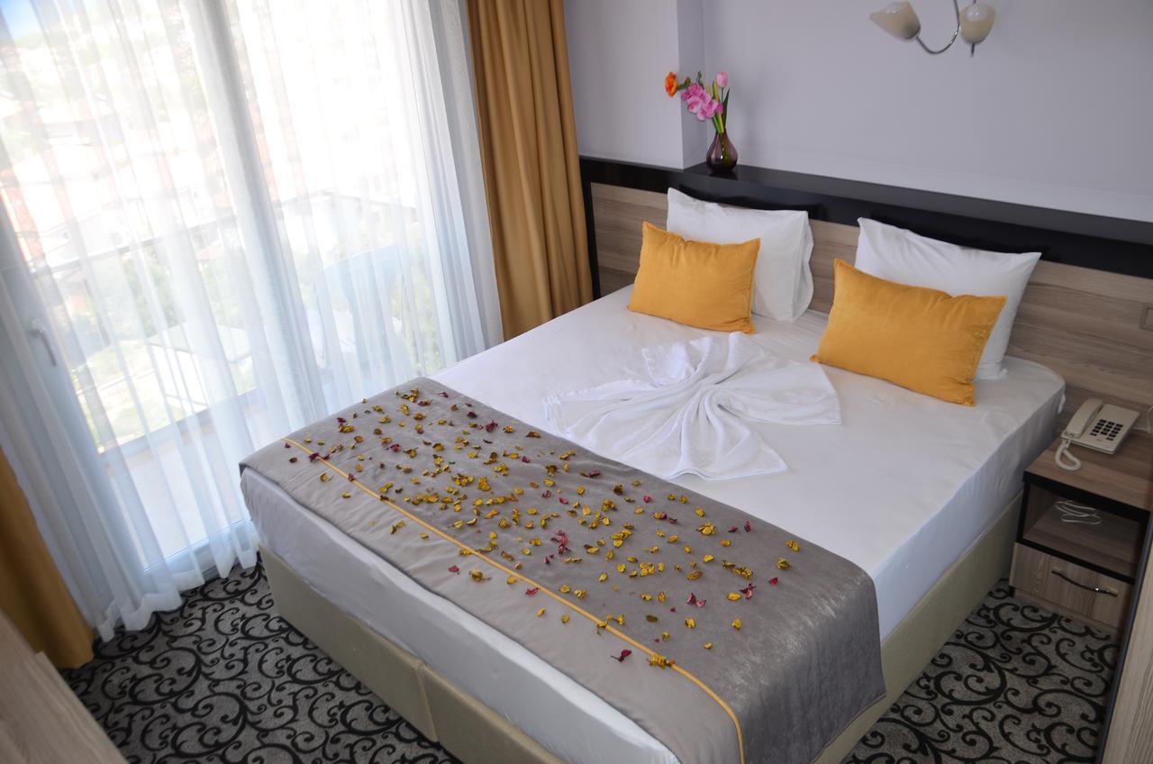 Elisa Hotel Ayvalı Pokoj fotografie